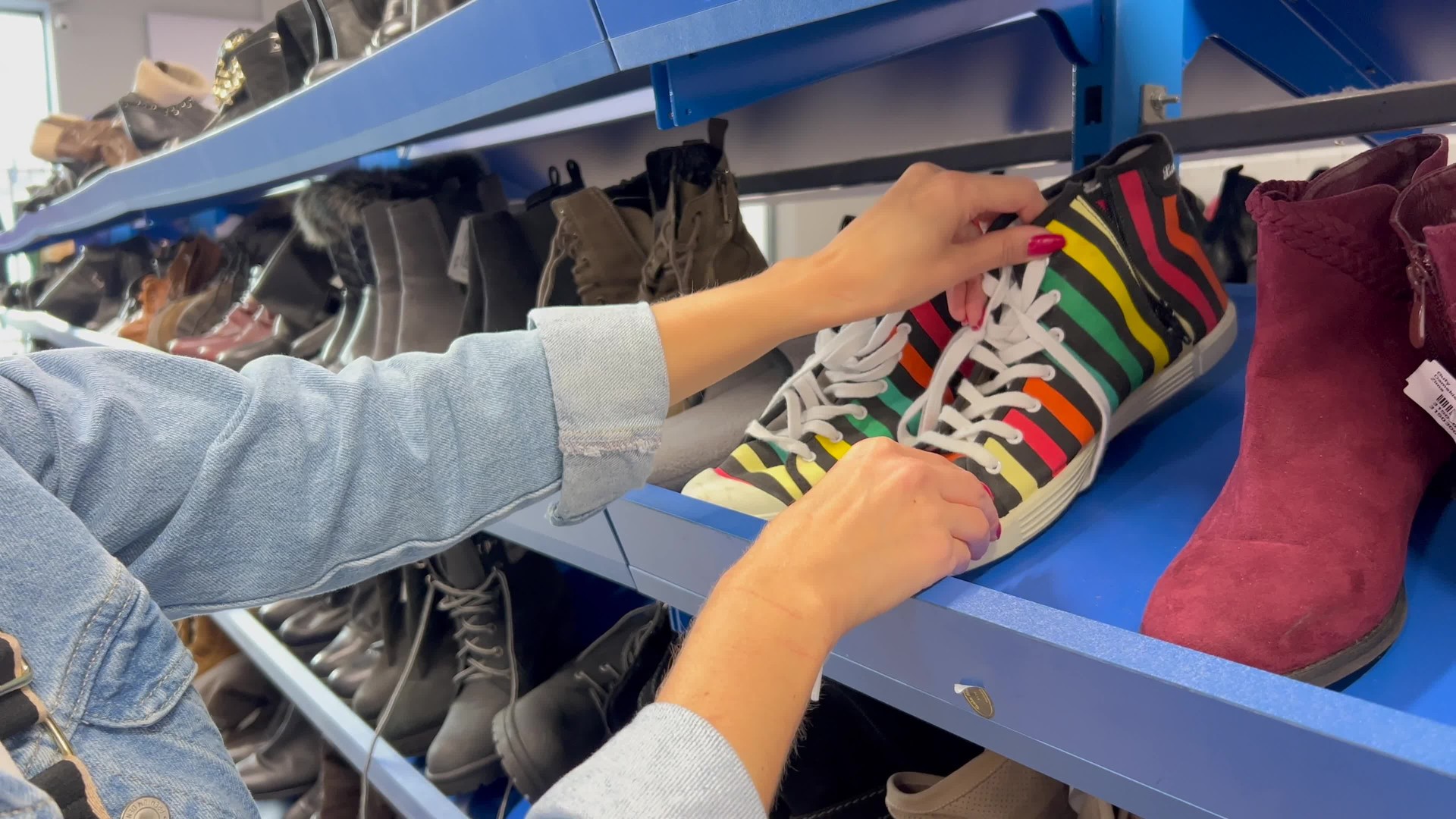 Second hand, buying used shoes. Close up